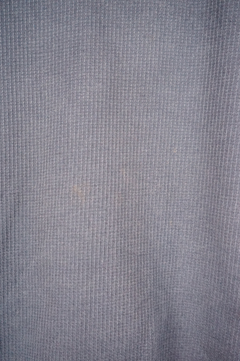 Navy blue sweatshirt with a logo on a white background