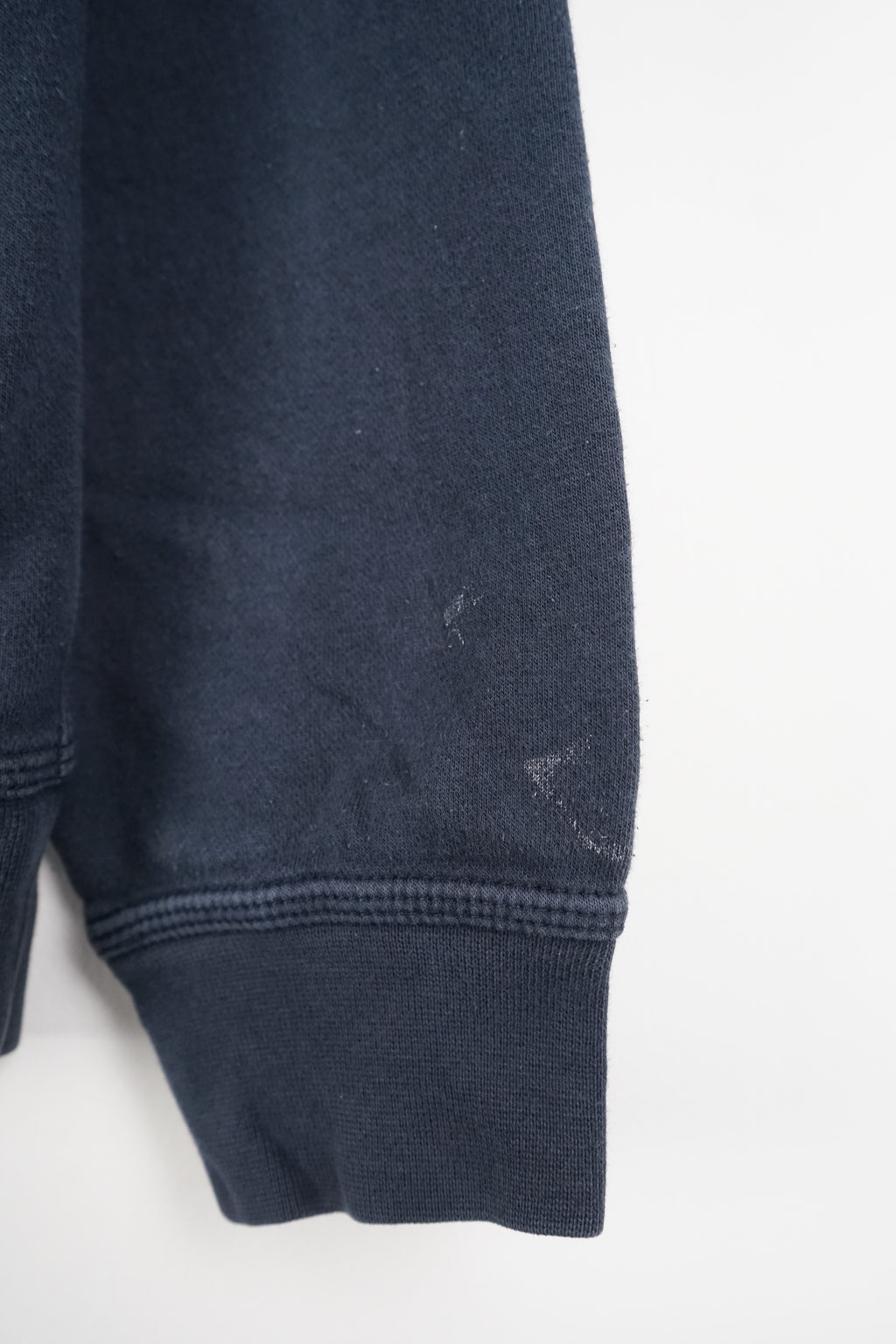 Navy blue hoodie with Nike logo on a white background