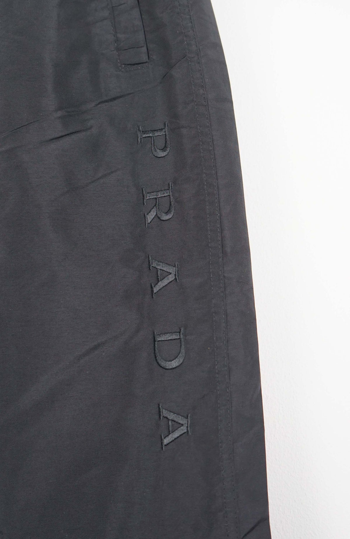 VINTAGE PRADA TRACK PANTS (S)