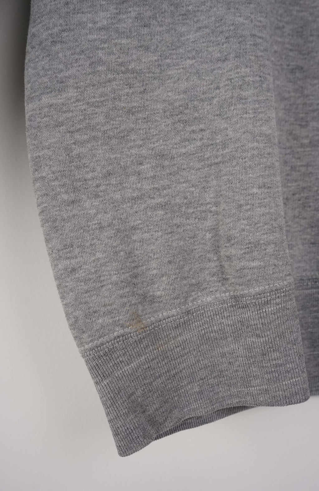 Gray sweatshirt with Detroit Red Wings logo on a white background