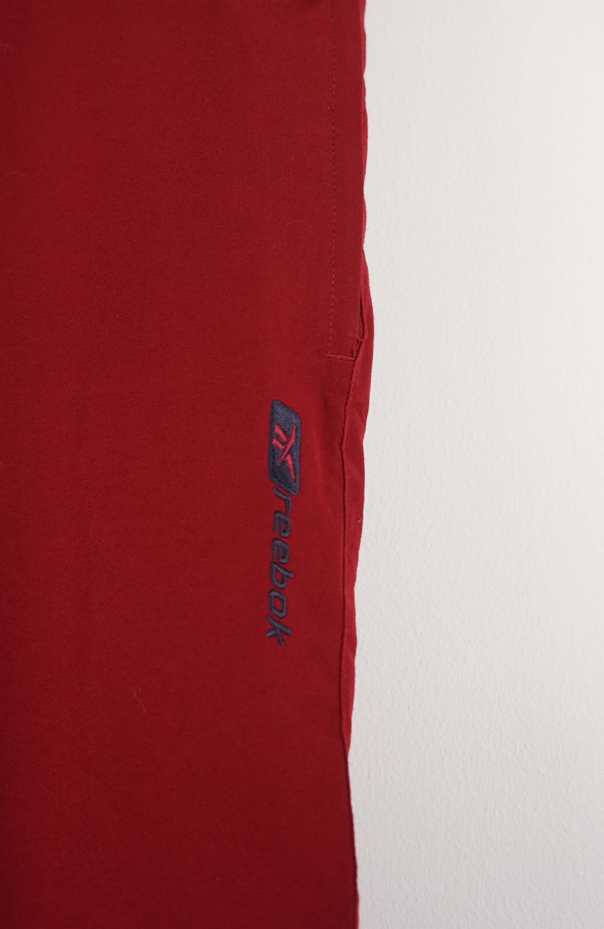VINTAGE REEBOK TRACK PANT SHORTS (XL)