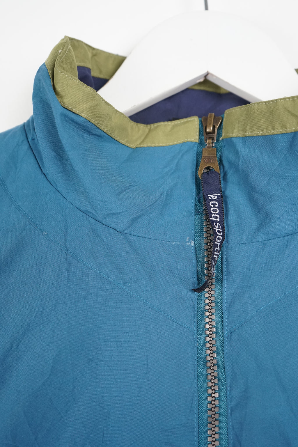 Color-blocked jacket with a logo on a white background
