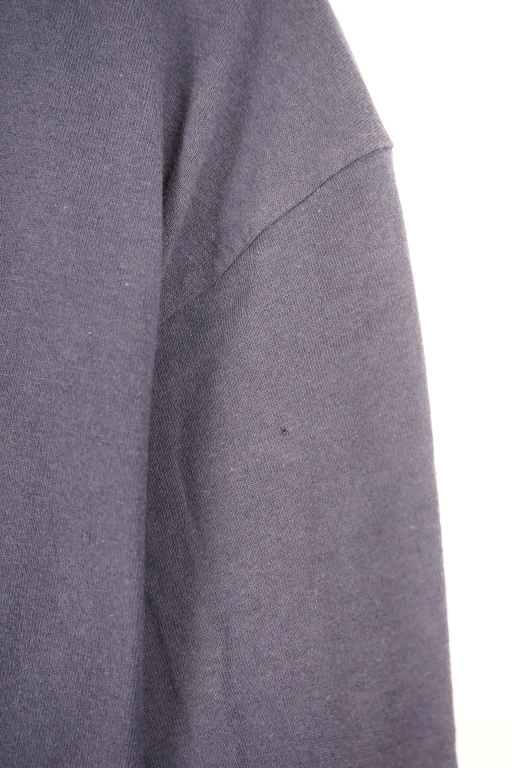 Navy blue t-shirt with New York Yankees logo on a white background