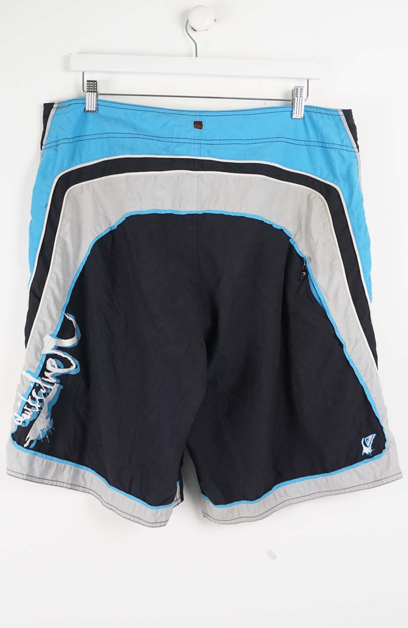 VINTAGE QUIKSILVER BOARD SHORTS W38