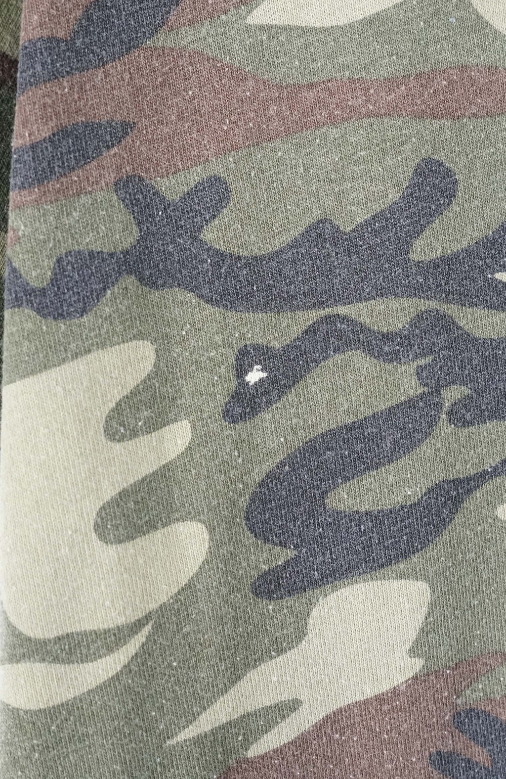 Camouflage t-shirt on a white background