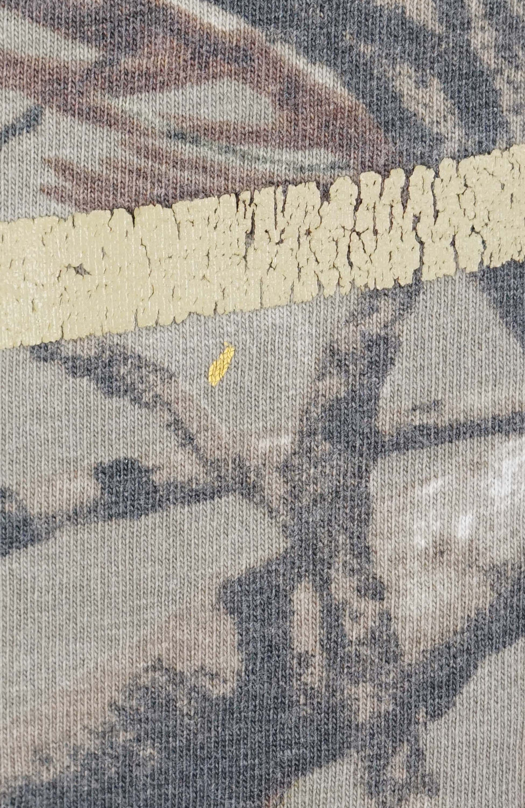 Camouflage t-shirt with 'Team Realtree' logo on a white background