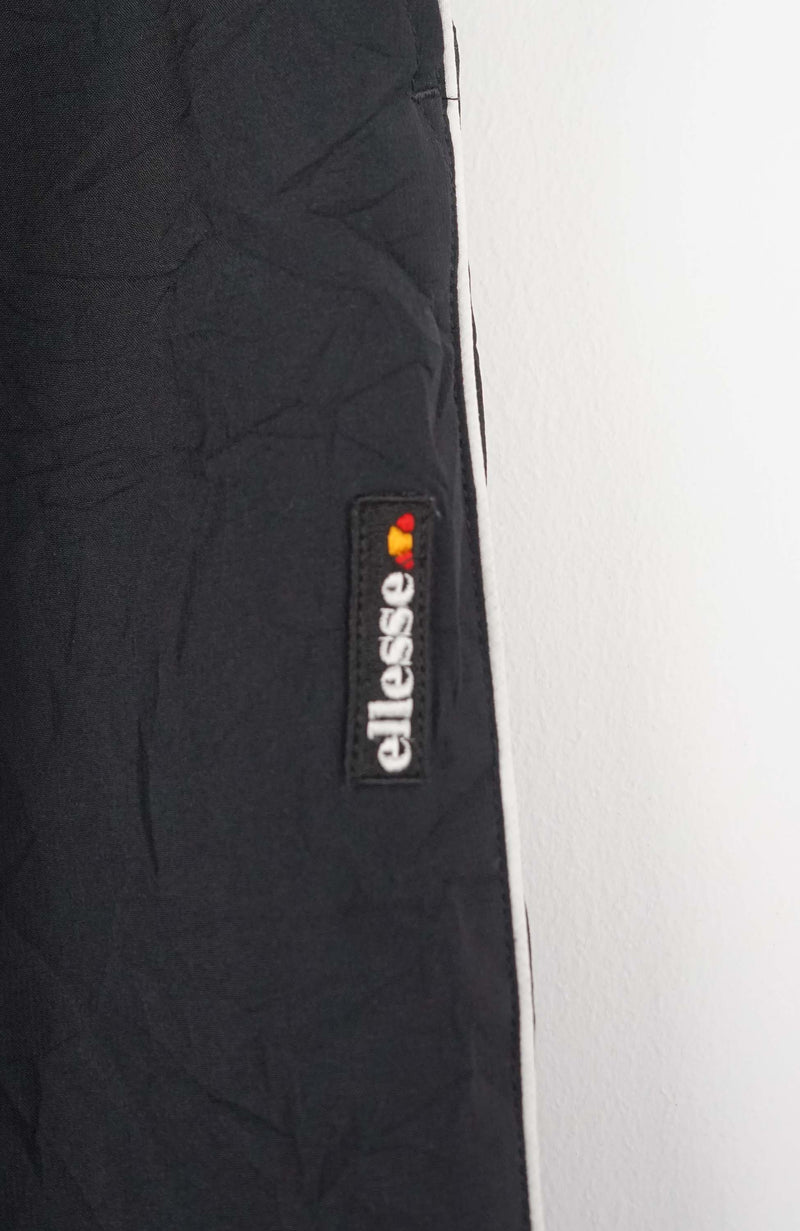 VINTAGE ELLESSE TRACK PANTS (S)