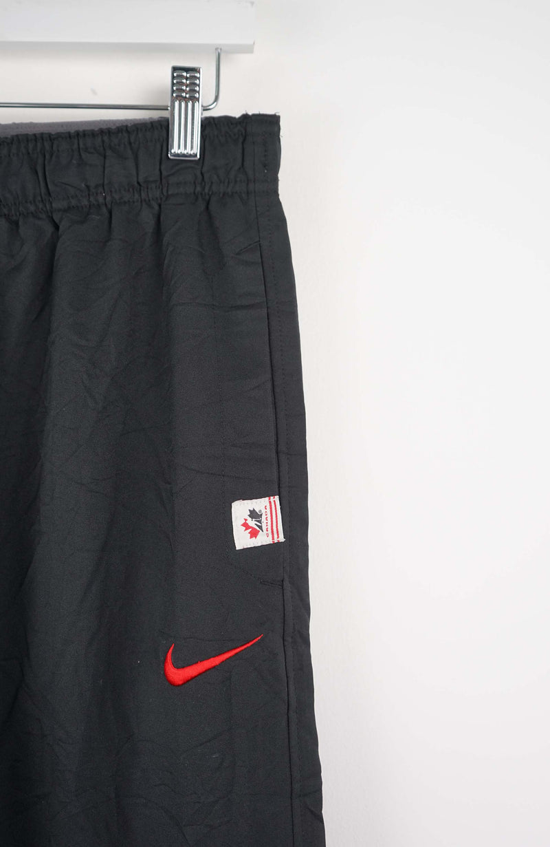 VINTAGE NIKE TRACK PANTS (M)
