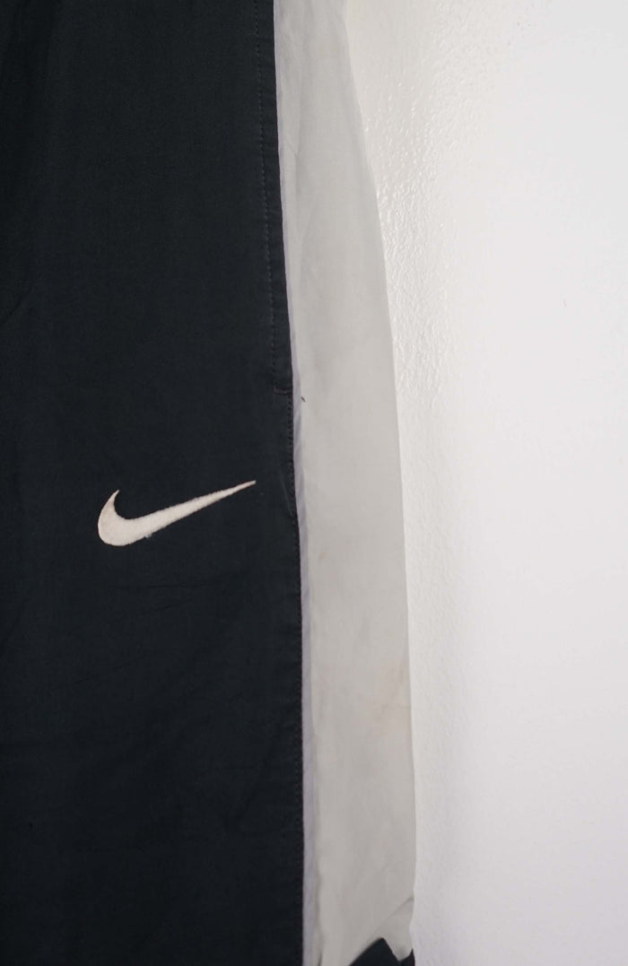 VINTAGE NIKE TRACK PANTS (S)