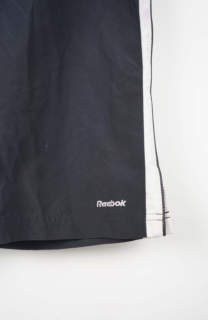 VINTAGE REEBOK 3/4 TRACK PANT SHORTS (XL)