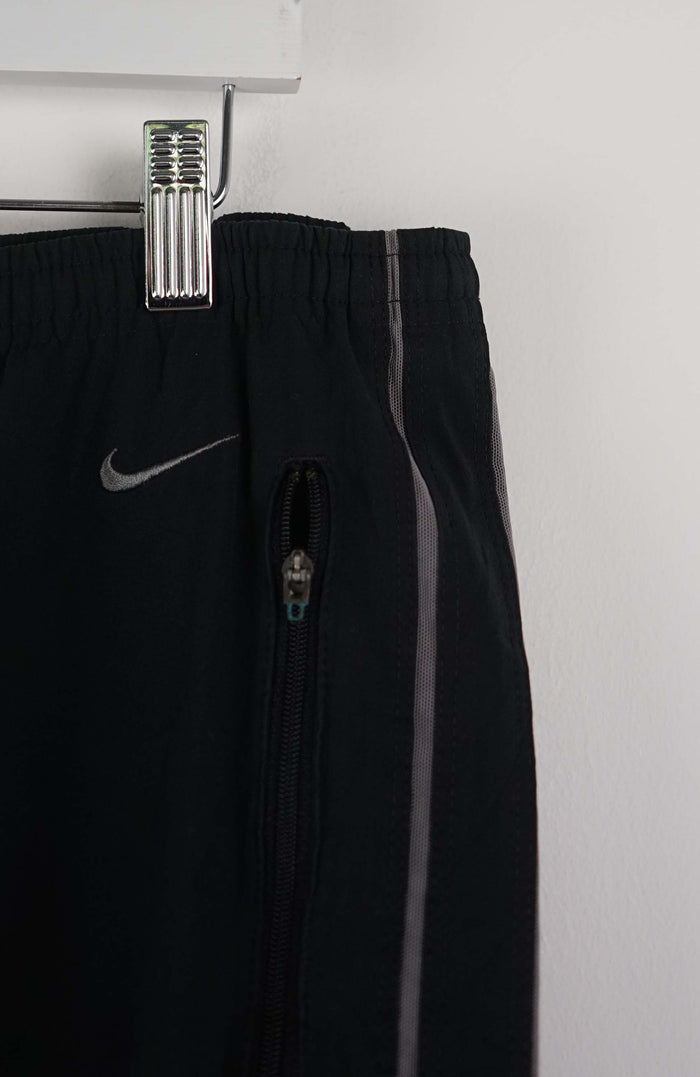VINTAGE NIKE TRACK PANTS (XL)