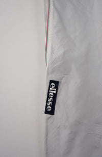 VINTAGE ELLESSE TRACK PANTS (S)