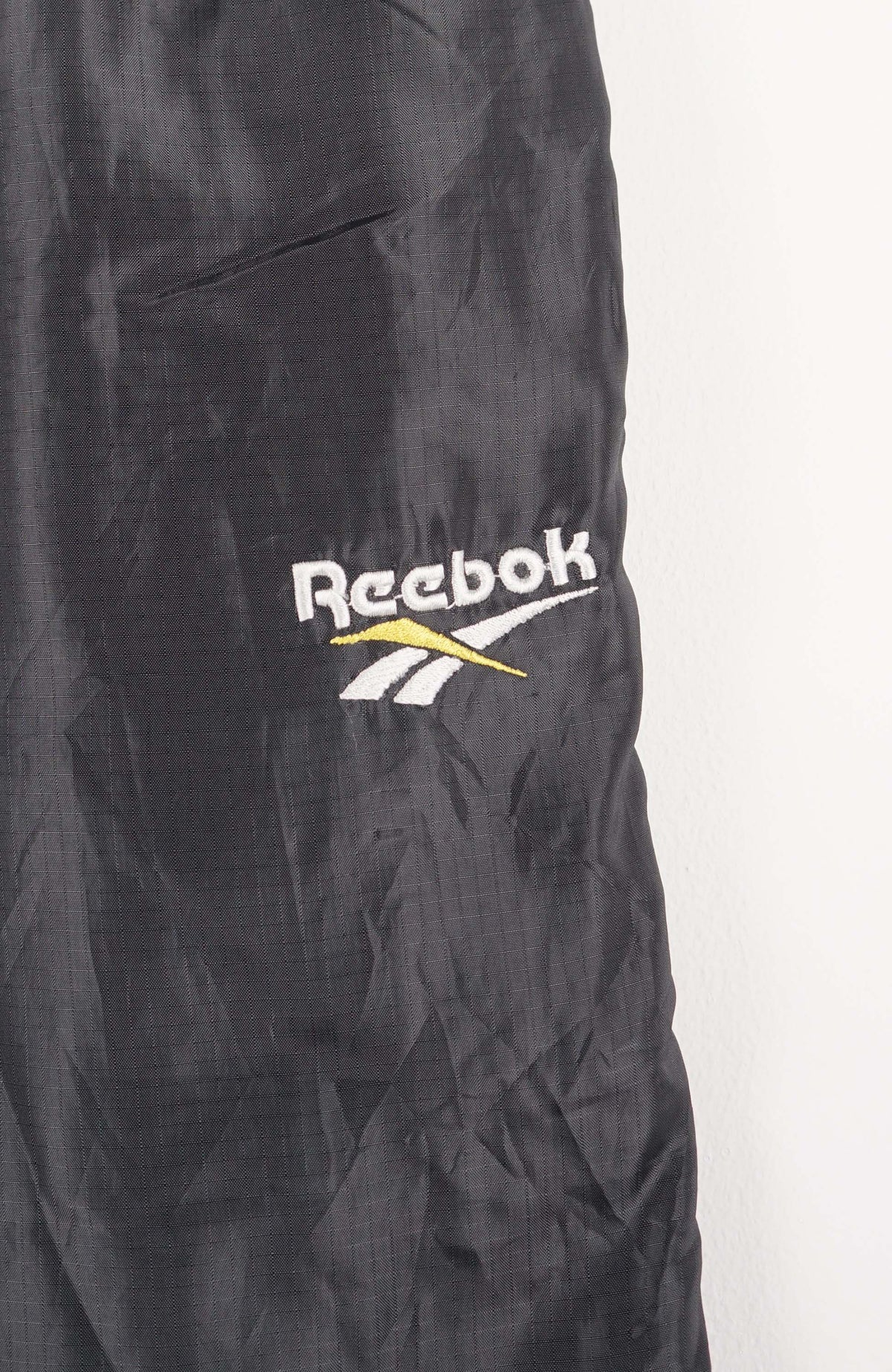 VINTAGE REEBOK TRACK PANT SHORTS (XS)