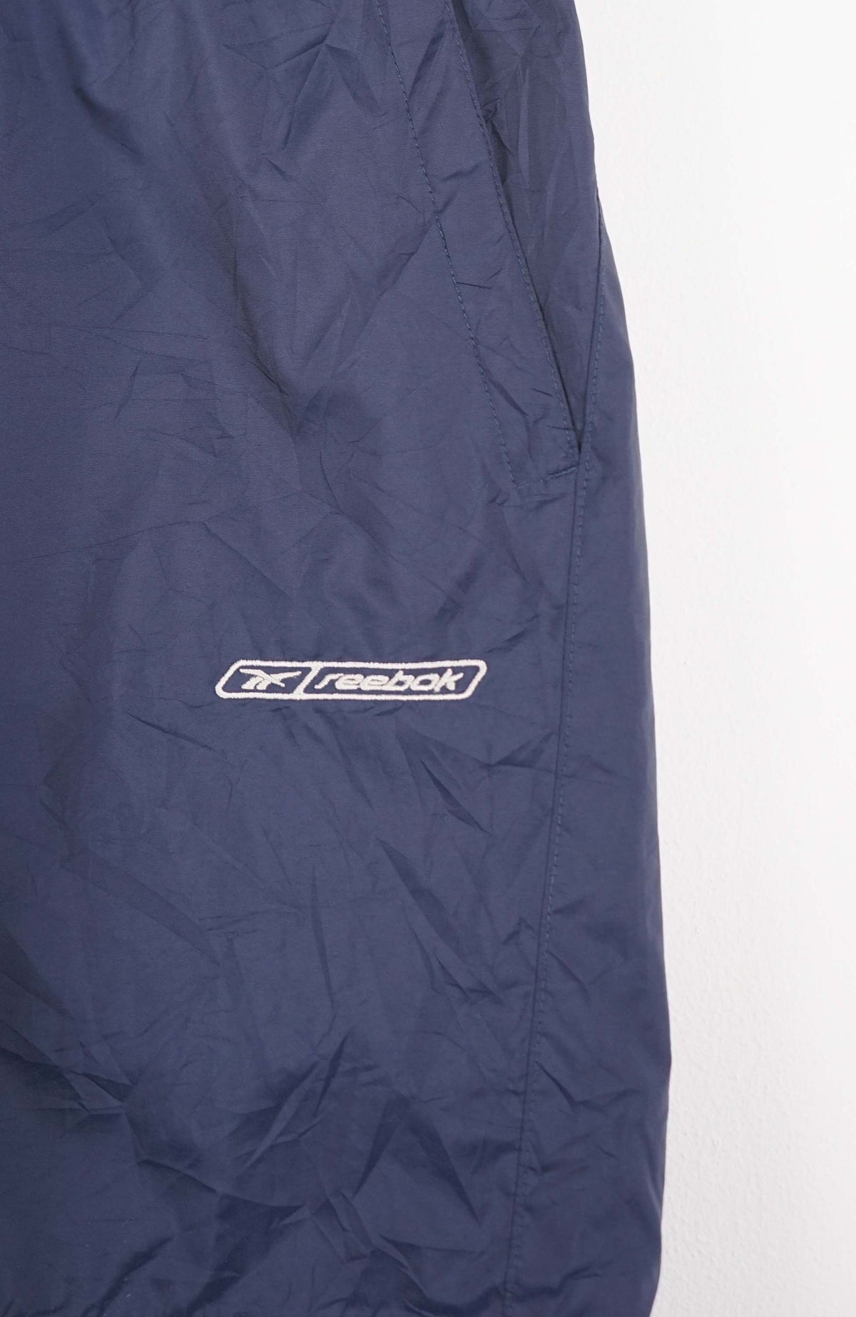 VINTAGE REEBOK TRACK PANT SHORTS (S)