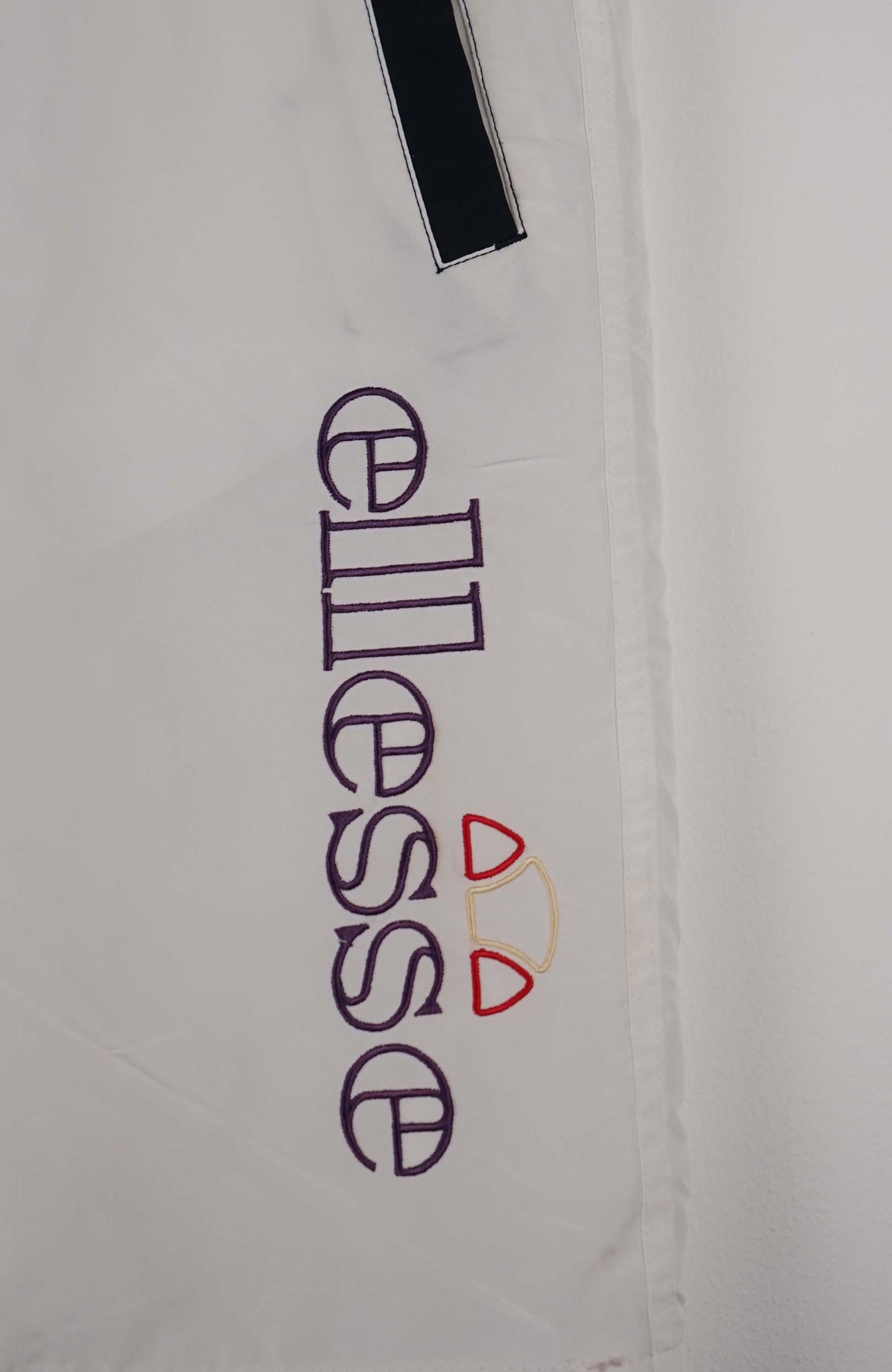 VINTAGE ELLESSE TRACK PANT SHORTS (XS)