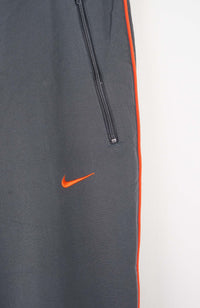 VINTAGE NIKE TRACK PANTS (L)