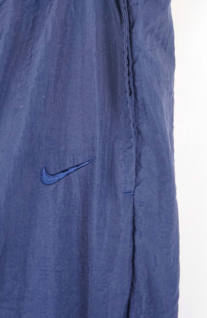 VINTAGE NIKE TRACK PANTS (L)