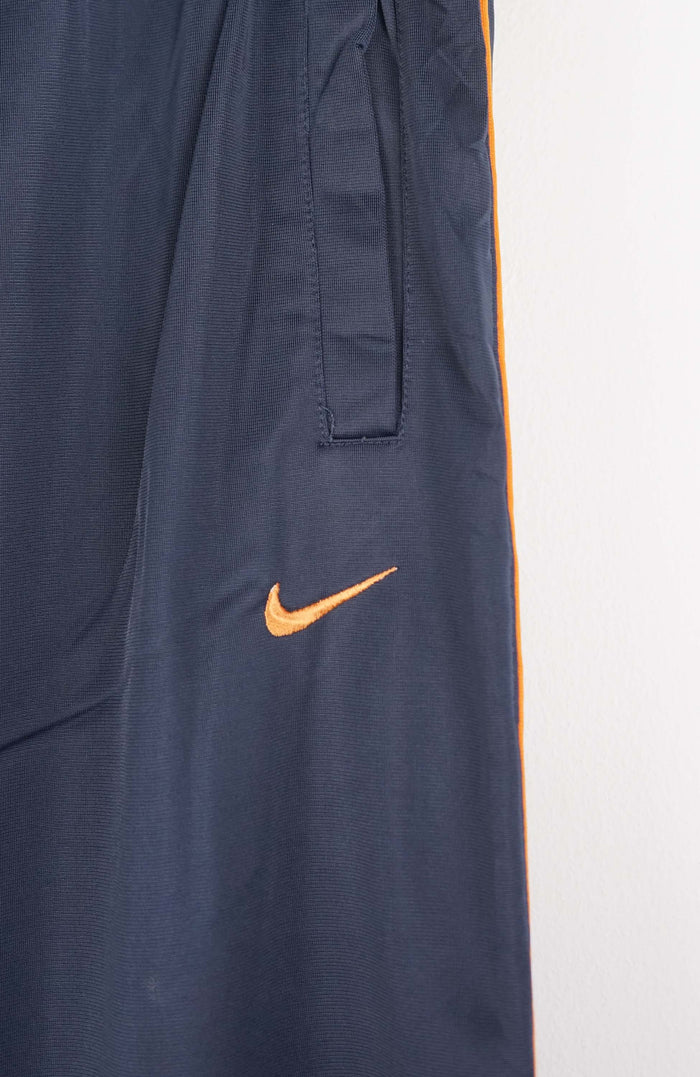 VINTAGE NIKE TRACK PANTS (L)