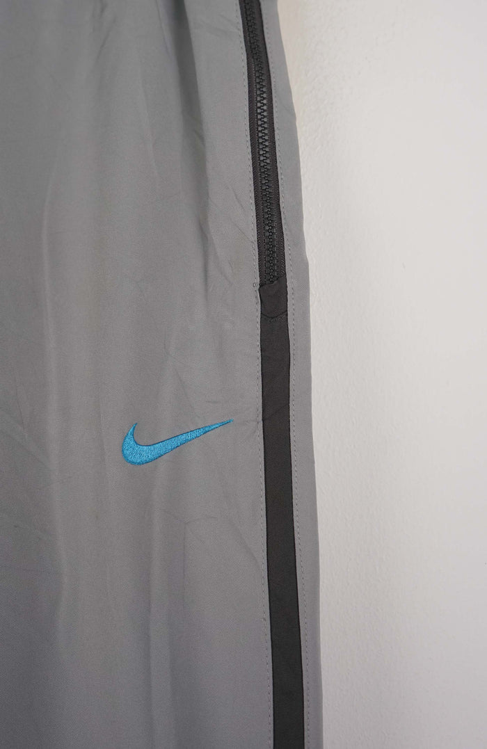 VINTAGE NIKE TRACK PANTS (M)