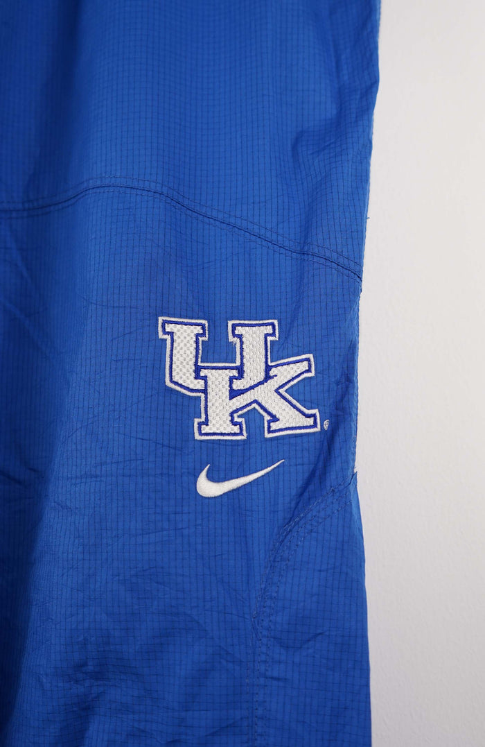 VINTAGE NIKE TRACK PANTS (L)