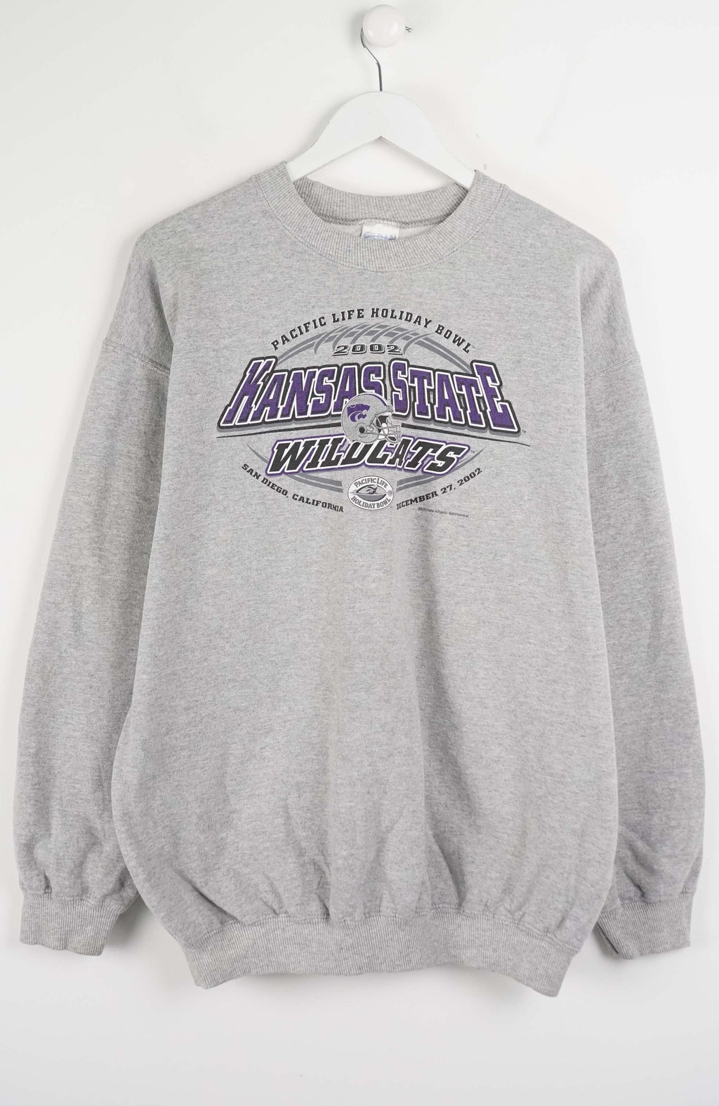 Gray sweatshirt with 'Kansas State Wildcats' text on a white background