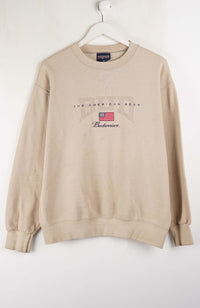 Beige sweatshirt with text and logo on a white background