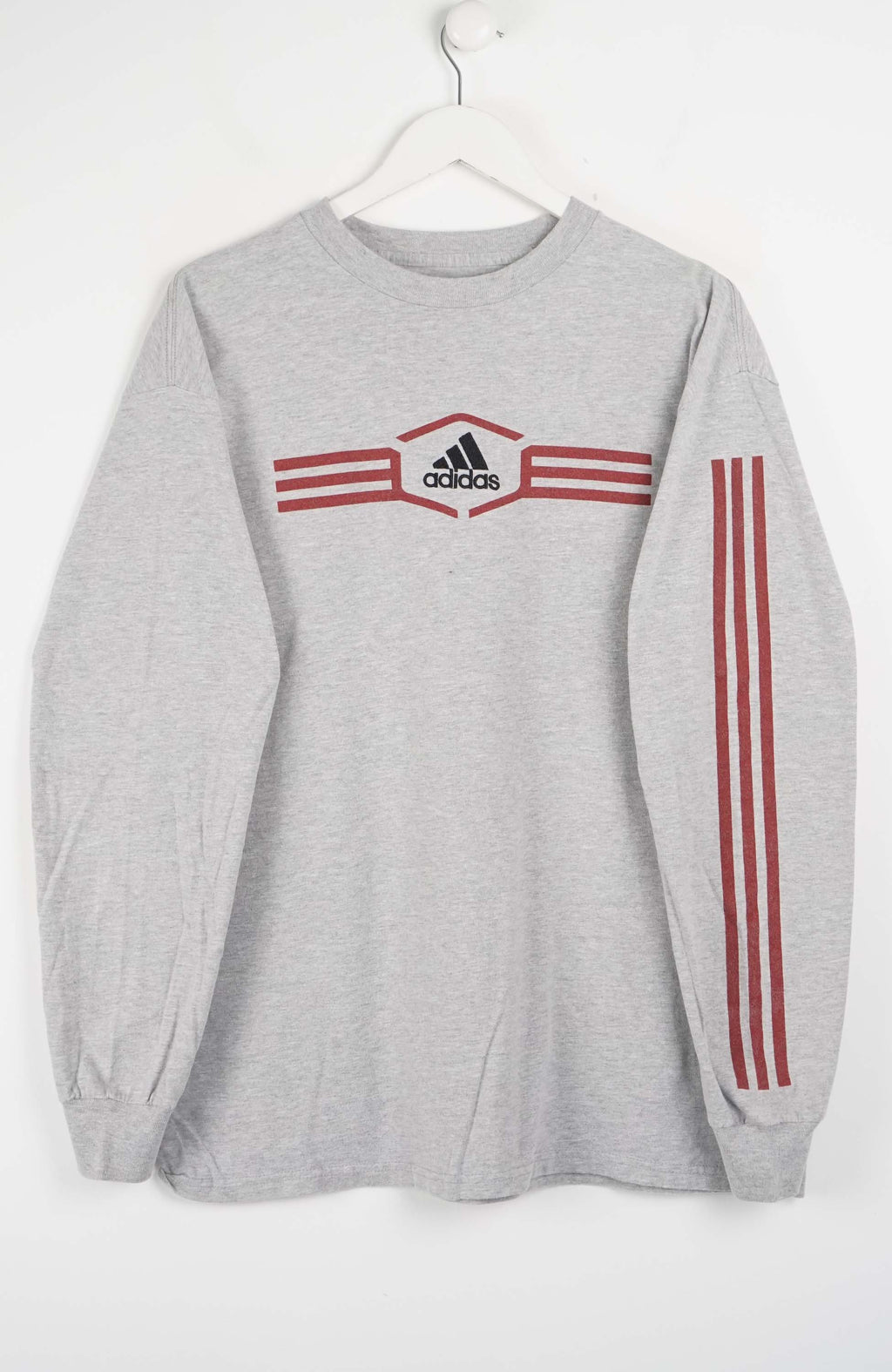 Gray t-shirt with red Adidas logo and stripes on a white background