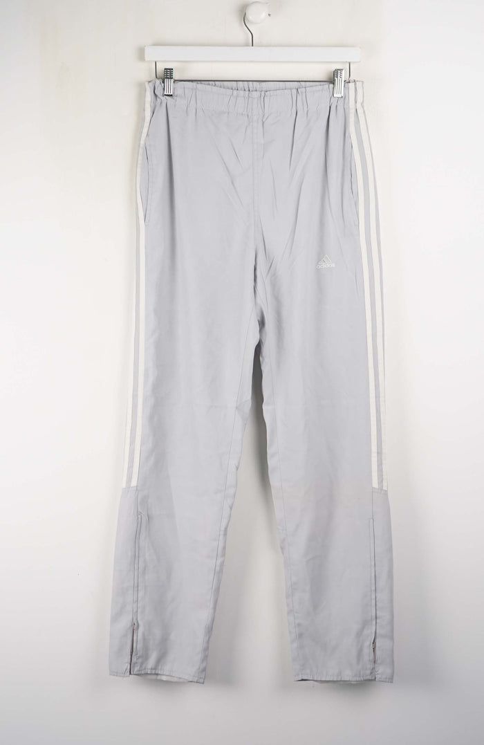 Light gray pants with white stripes on a white background