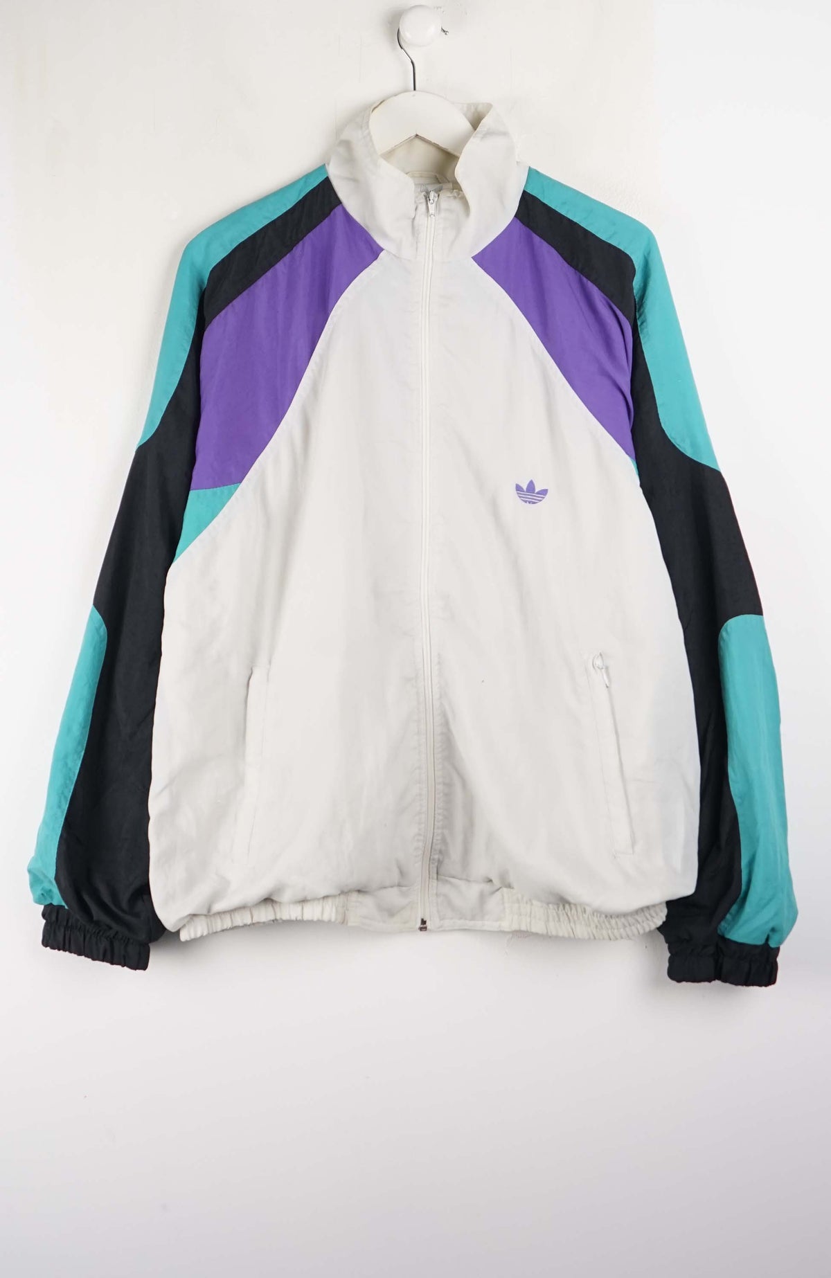 Colorful jacket with Adidas logo on a white background