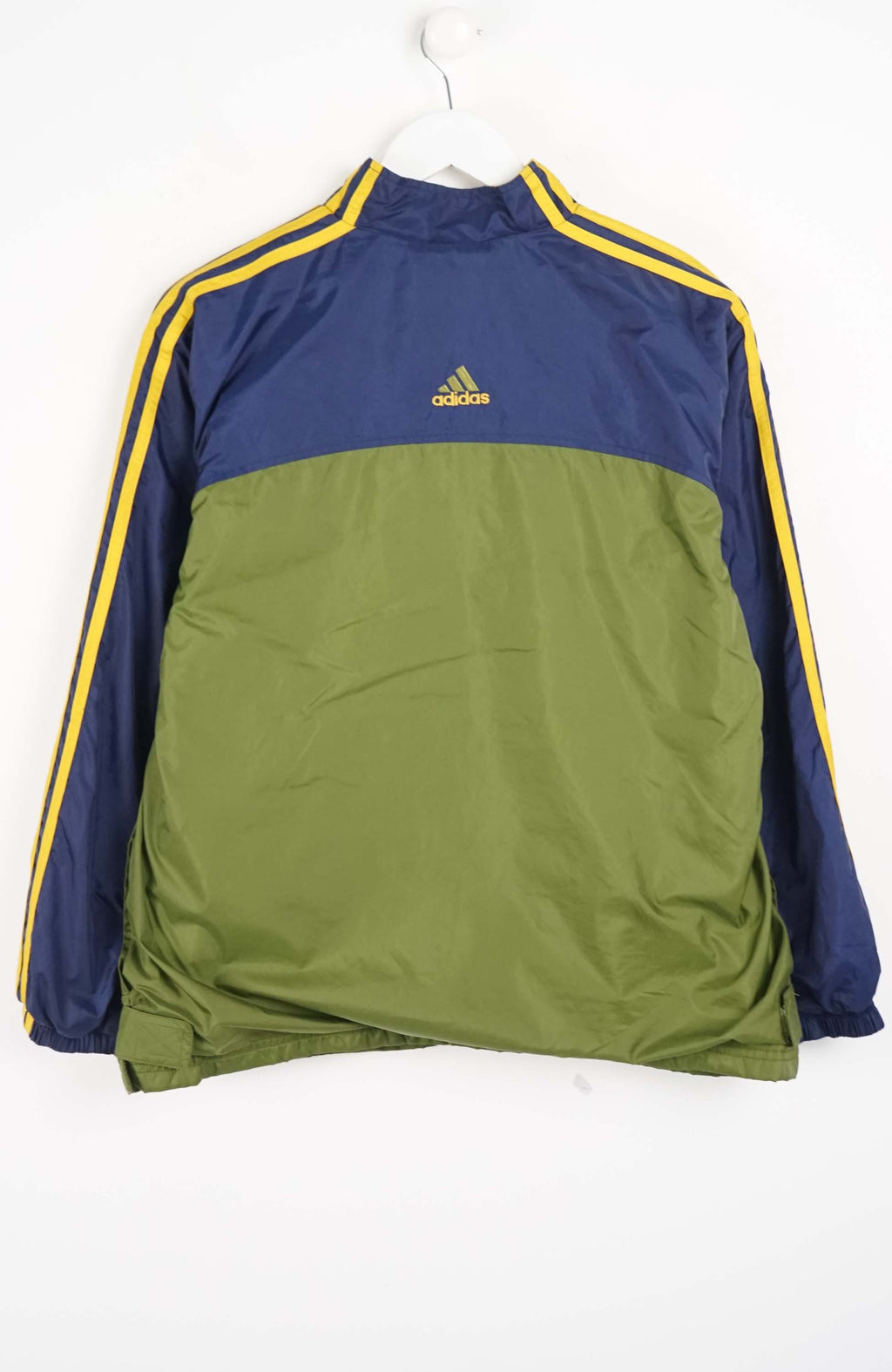 Green and blue jacket with Adidas logo on a white background