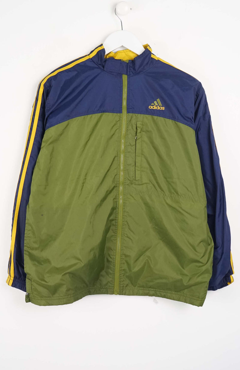 Green and blue jacket with Adidas logo on a white background