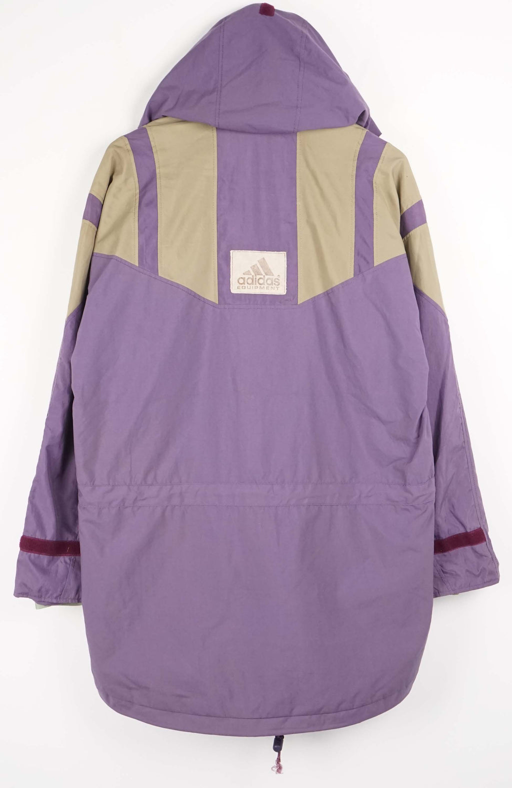 Purple jacket with beige accents on a white background