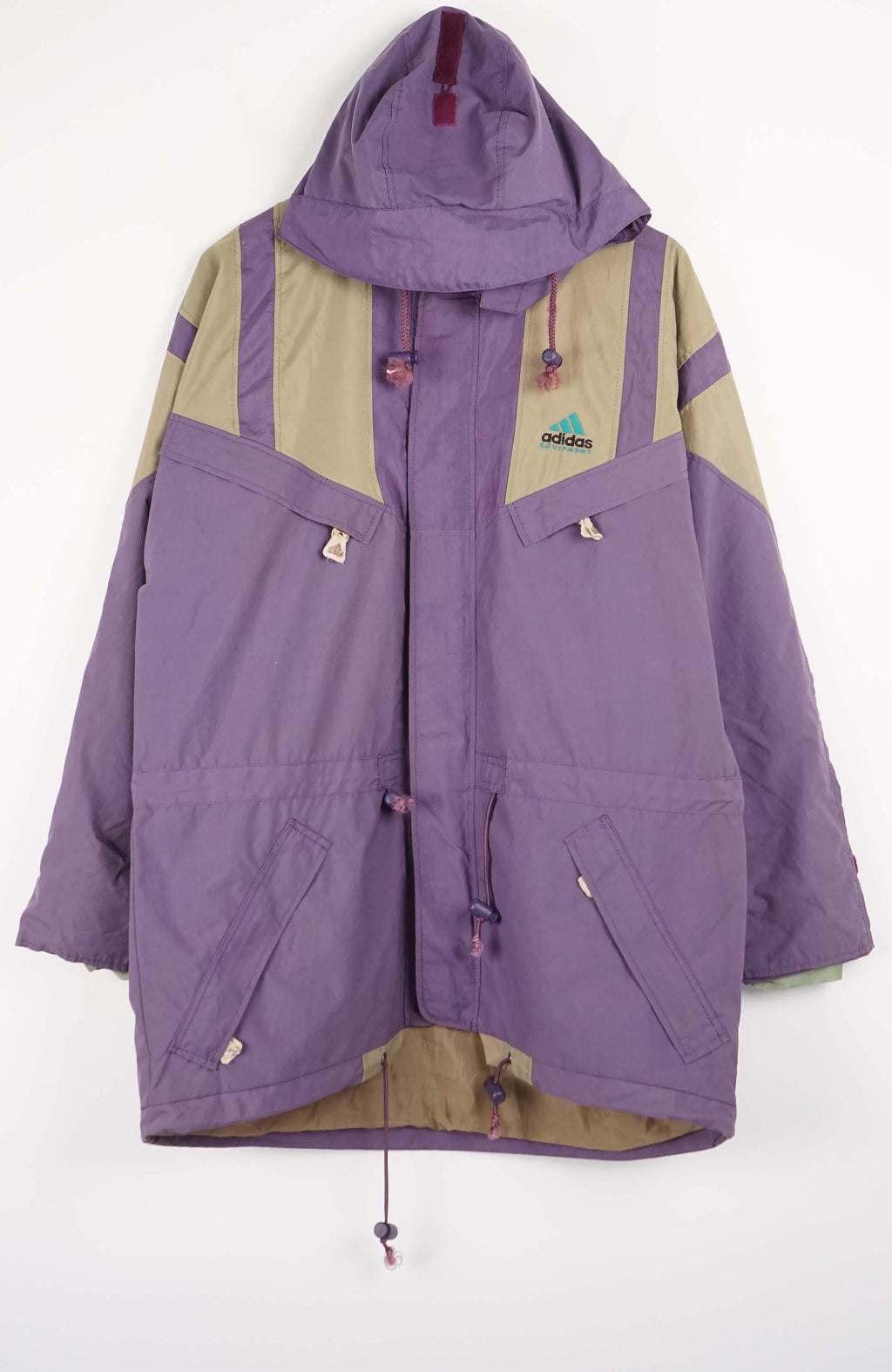 Purple jacket with beige accents on a white background