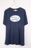 Navy blue t-shirt with 'American Idle' logo on a white background