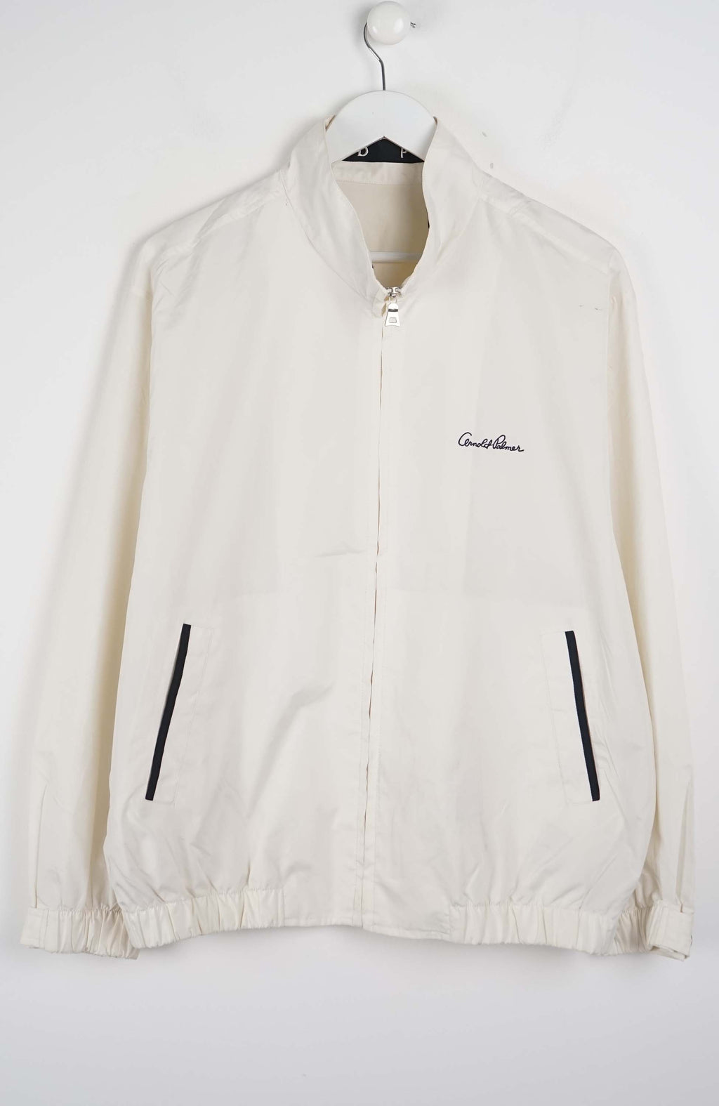 White jacket with black accents on a white background