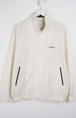 White jacket with black accents on a white background