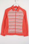 Red and white striped shirt on a hanger against a white background
