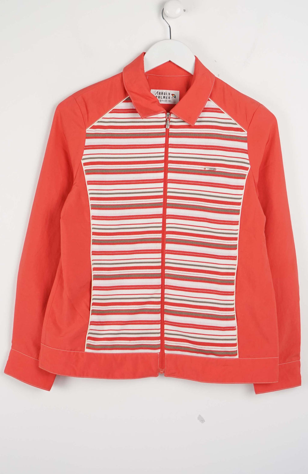 Red and white striped shirt on a hanger against a white background