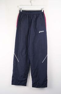 Navy blue pants with red accents and Asics logo on a white background