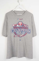 Gray t-shirt with World Series Champions logo on a white background