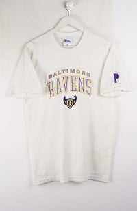 White long-sleeve shirt with Baltimore Ravens logo on a white background
