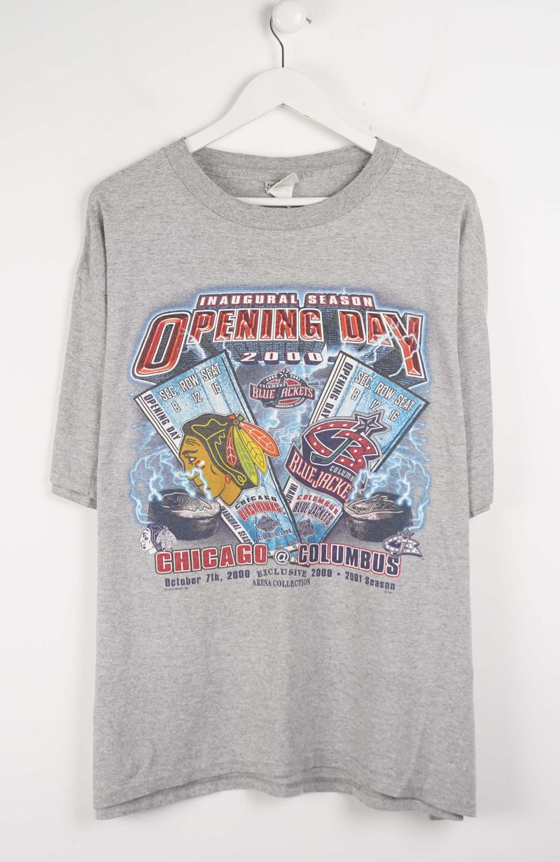 Gray t-shirt with sports-themed graphic on a white background