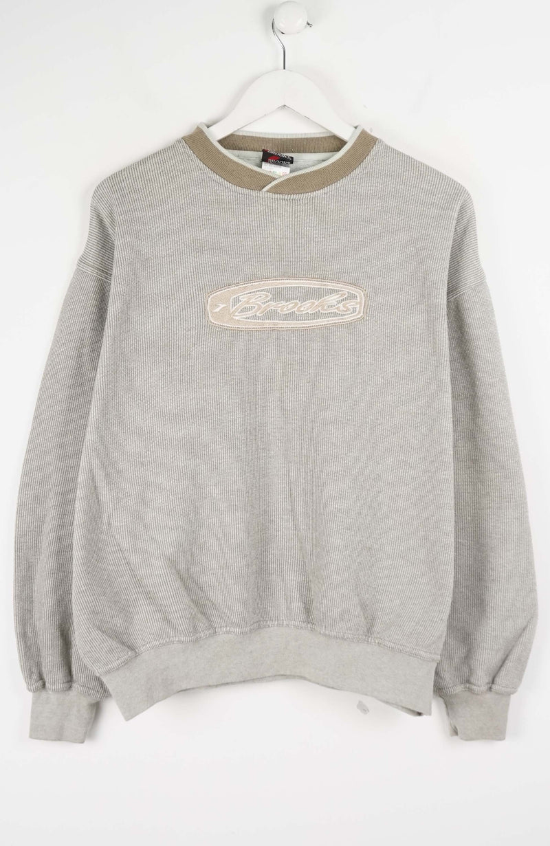 Gray sweatshirt with a logo on a white background