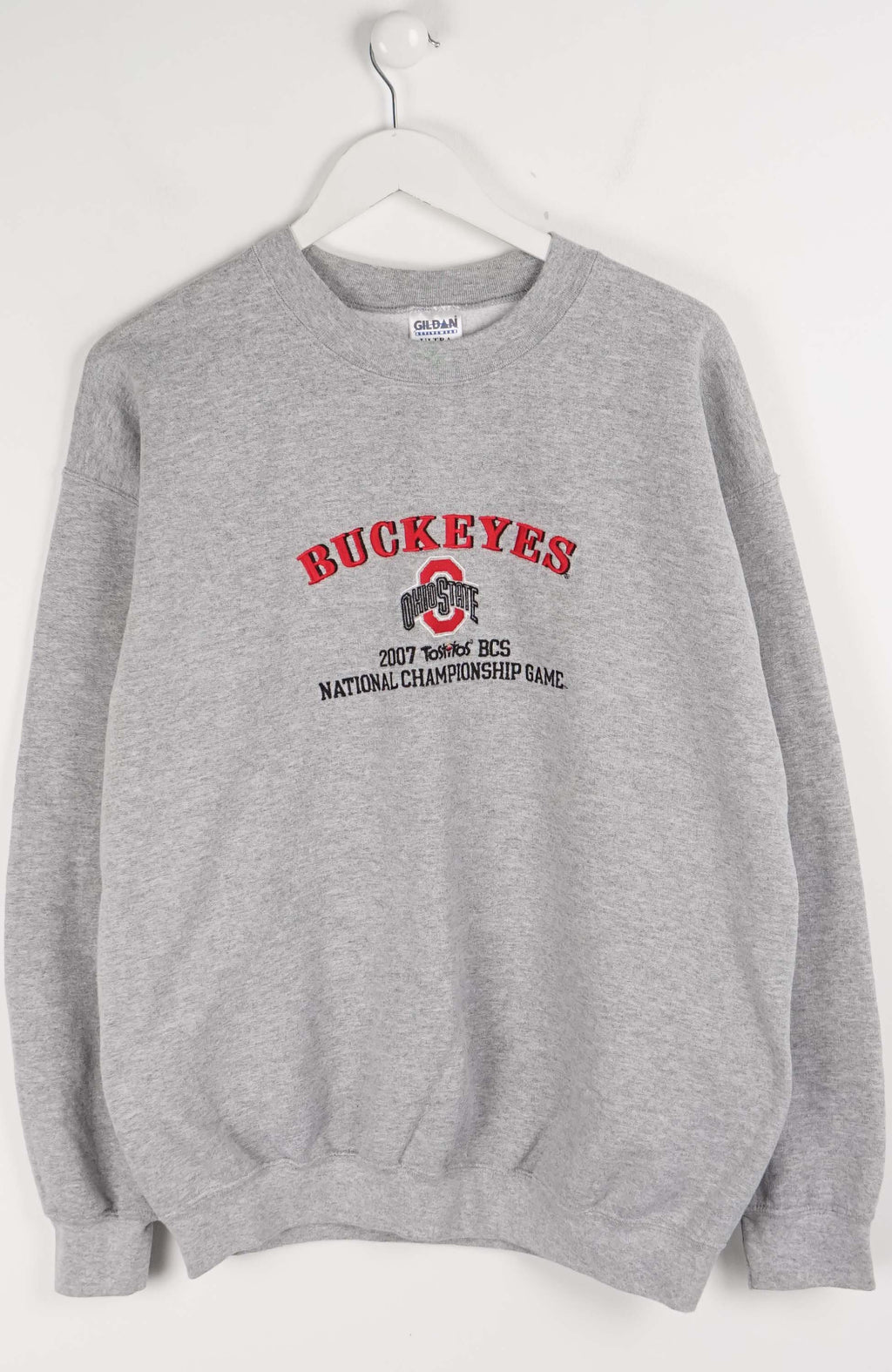 Gray sweatshirt with 'Buckeyes' and championship text on a white background