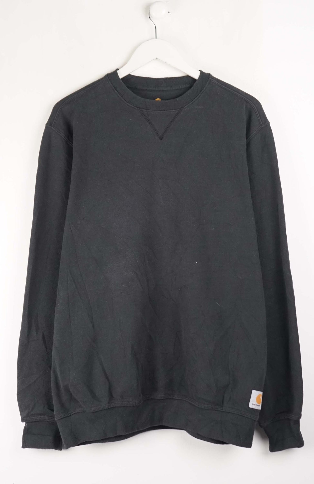 Dark gray sweatshirt on a white hanger against a white background