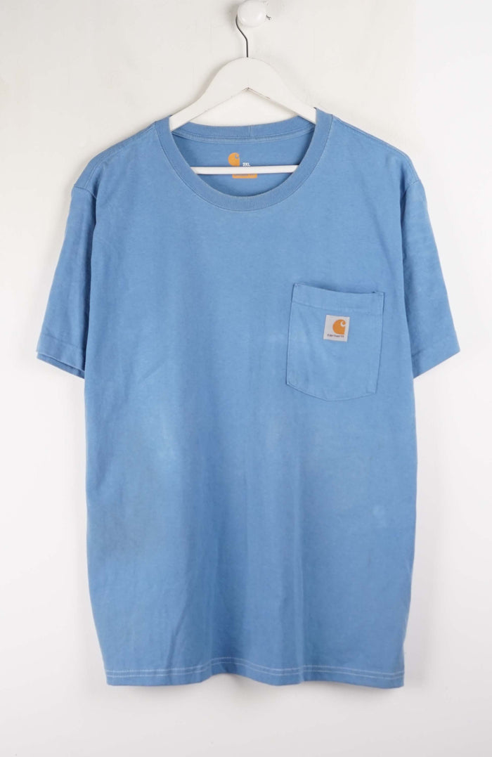 Blue t-shirt with a pocket on a white background