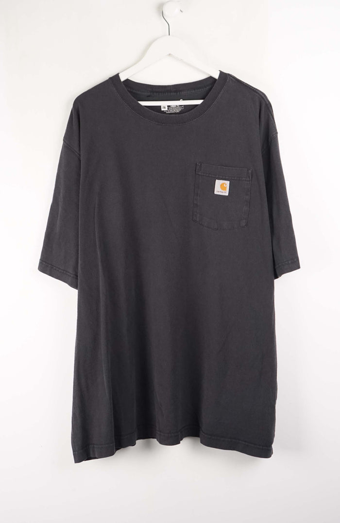 Black t-shirt with a pocket on a white hanger