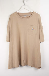 Beige long-sleeve shirt with a pocket on a white hanger against a white background