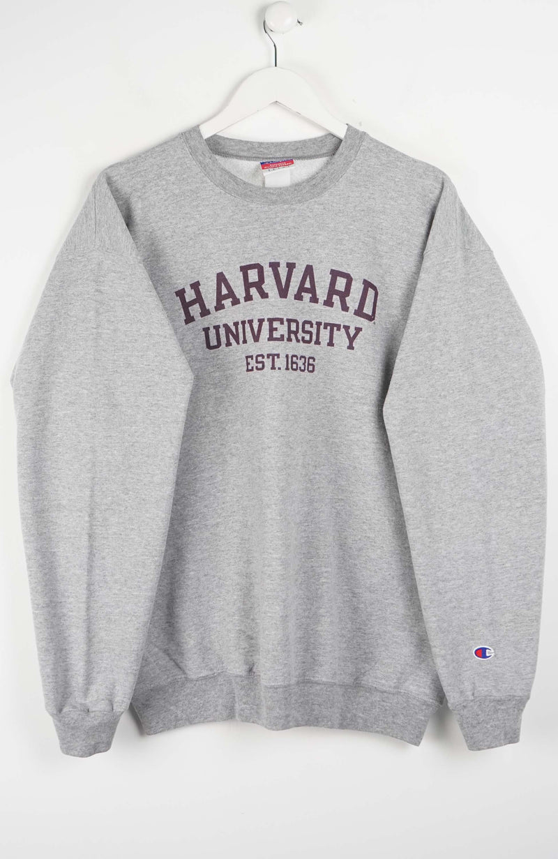 Gray sweatshirt with Harvard University text on a white background