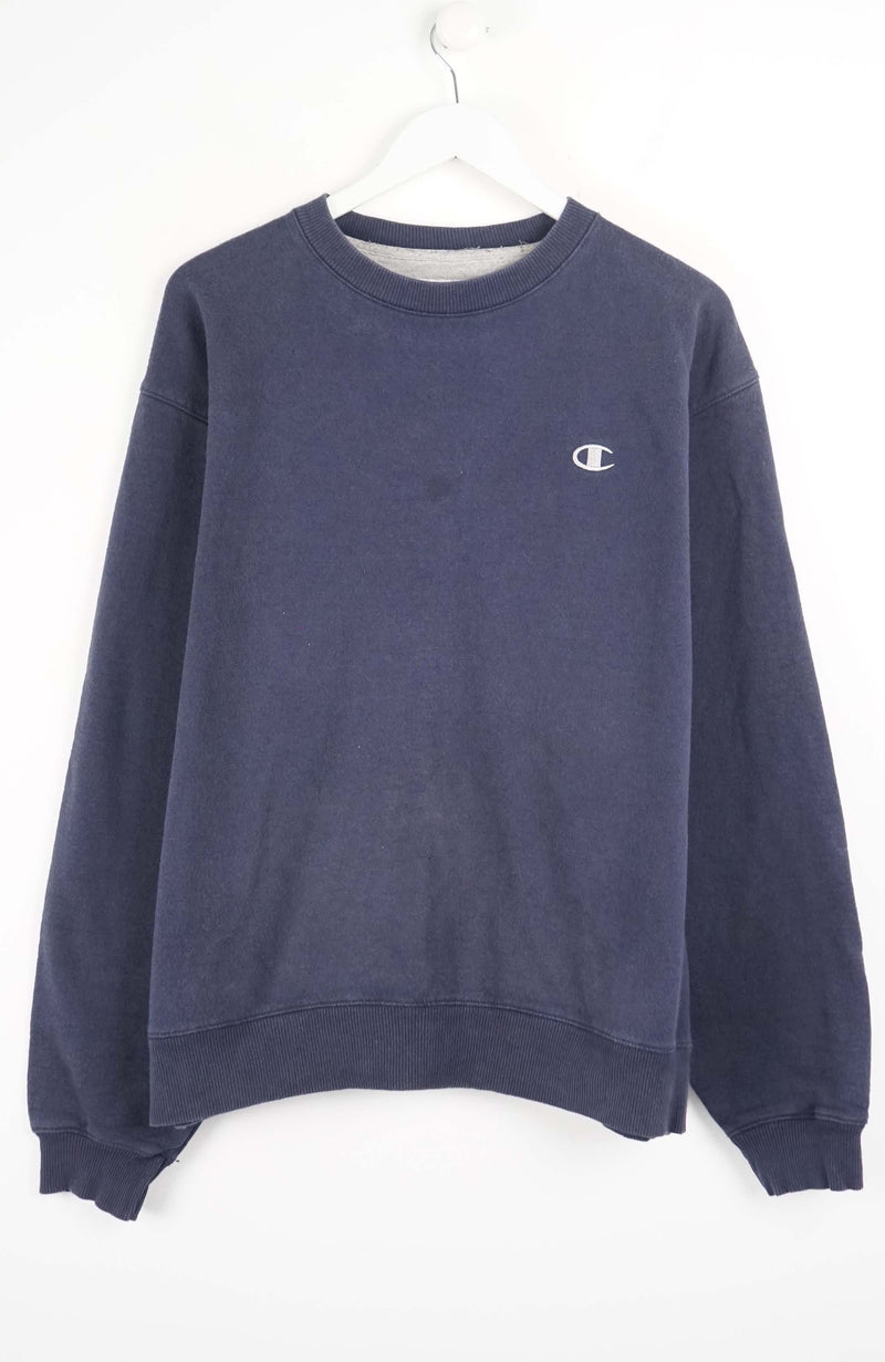 Navy blue sweatshirt with a small logo on a white background